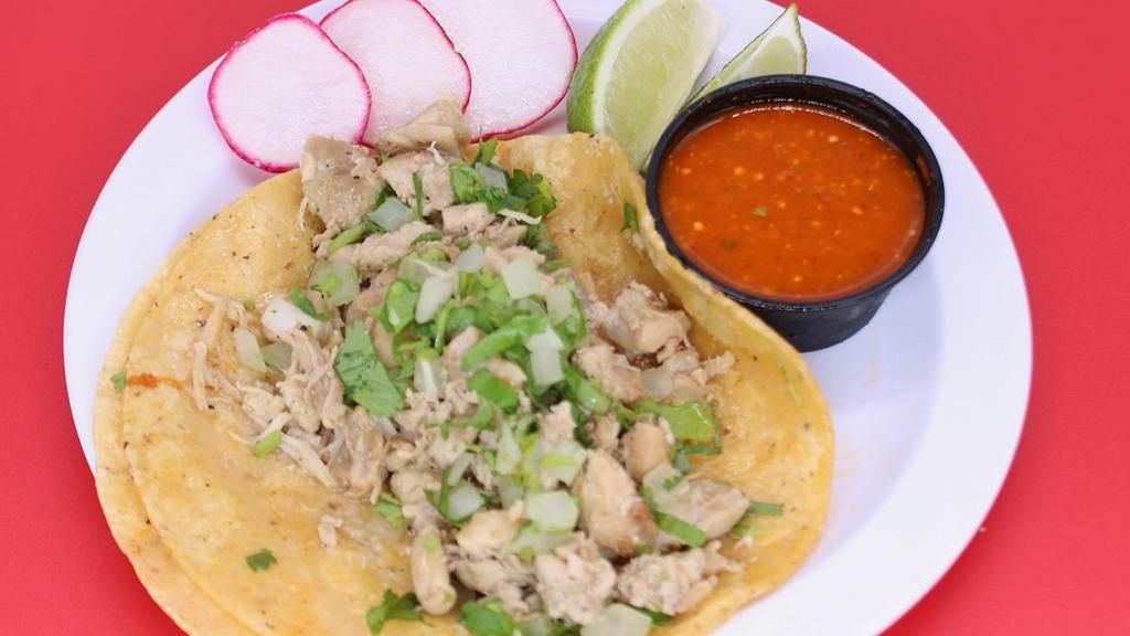 Large Taco: Pollo (Chicken) · A large tortilla with the meat of your choice topped with onions and cilantro.