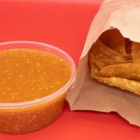 Chips and 8 oz Salsa · Our homemade salsa and chips goes great with any meal.