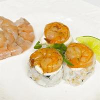 Uramaki Camarão (8 Pcs) · Roll de arroz com alga por dentro recheado com Camarão grelhado, pepino cream cheese, ceboli...