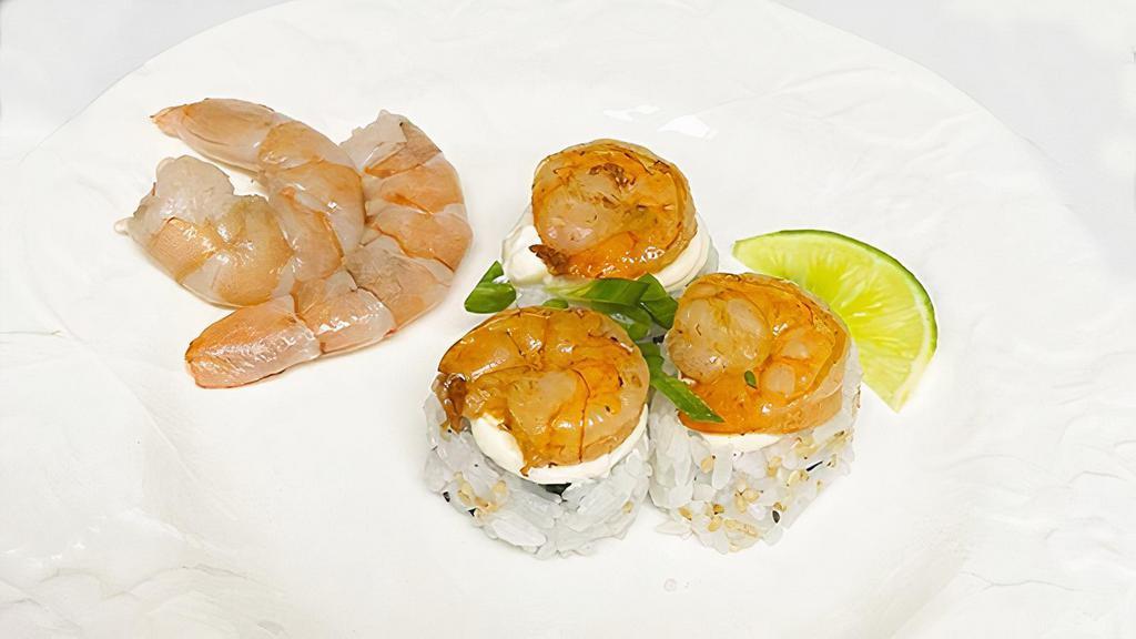 Uramaki Camarão (8 Pcs) · Roll de arroz com alga por dentro recheado com Camarão grelhado, pepino cream cheese, cebolinha e coberto com gergelim.