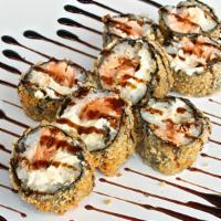 Hot Roll (4pcs) · Rice wrapped in seaweed with salmon and cream chief - served with tare sauce / Arroz envolto...