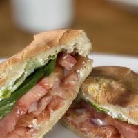 Lox Bagel · Toasted bagel with cream cheese, smoked salmon, green leaf lettuce, fresh tomatoes, and onio...