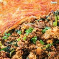Chorizo Scramble · Spicy pork chorizo, mushrooms, onions, and spinach. Comes with your choice of hash browns, c...