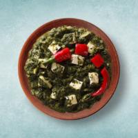 Cottage Cheese In Spinach · Cottage cheese cooked in spinach curry with spices and onion, garlic and tomato. Served with...