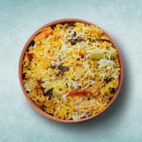 Aromatic Vegetable Biryani  · Imported basmati rice cooked with fresh assorted dished vegetables cooked with our special h...