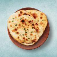Plain Naan  · Leavened refined wheat  flatbread baked in a tandoor clay oven.