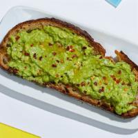 Avocado Toast · Smashed avocado on whole wheat toast topped with red chili flakes, cracked sea salt, and oli...
