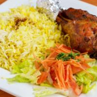 Lamb Shank Dala'a  · Whole lamb shank, basmati rice, lentil soup, salad, hummus+ pita bread.