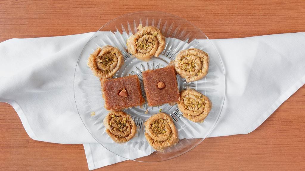 Baklawa (Baklava) · Filo filled with  chopped nuts, glazed with sweetened syrup.