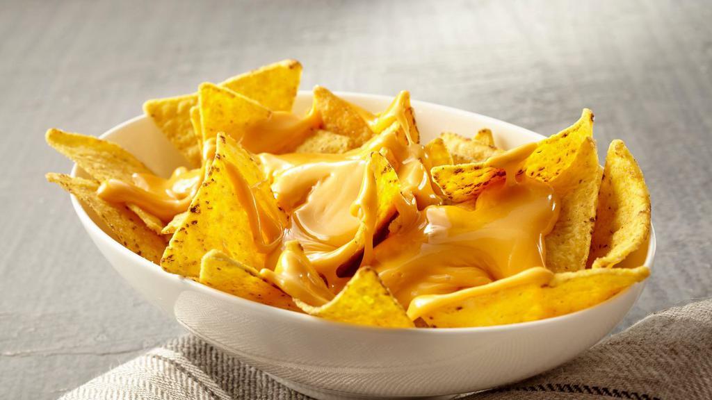 Cheese Nachos · Fresh tortilla chips smothered in cheese.