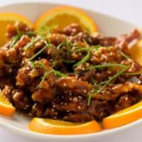 (C) Sesame Chicken · Strips of chicken lightly fried in a sweet and tangy sauce; topped with a sprinkle of sesame...