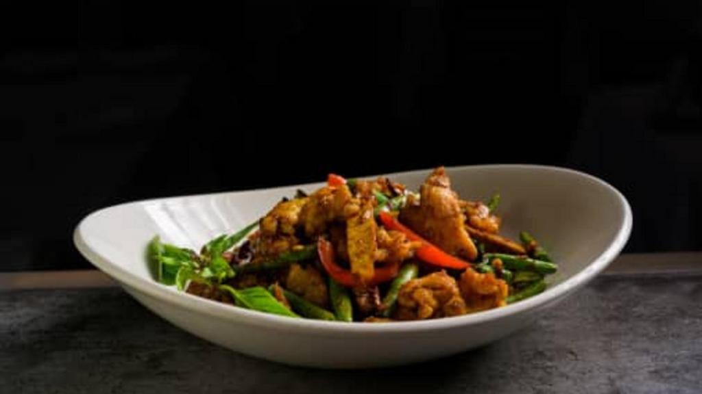 Fiery Chicken Tofu · Chicken breast wok fried with tofu, string beans, bell peppers and basil in a sweet and spicy sauce.
