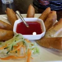 S5- Chinese Style Vegetarian Egg Rolls (4) · Deep-fried rolls stuffed with cabbage, mushrooms, carrot, glass noodles and onion, served wi...