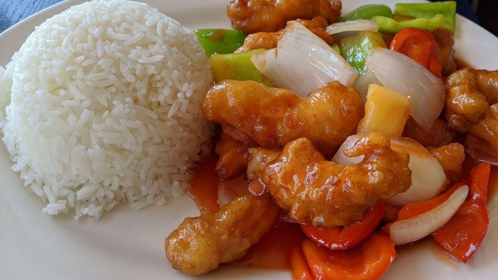 F1- Sweet and Sour Chicken · Battered & fried chicken sauteed with onions, pineapple, and bell peppers in a sweet & sour sauce.