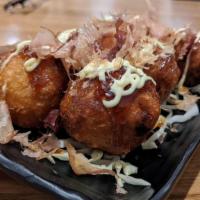 Takoyaki (6 Pcs.) · Takoyaki is a Japanese snack made of a wheat flour-based batter. It is typically filled with...