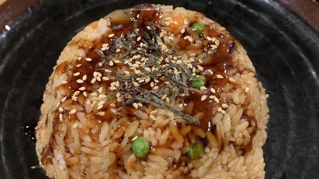 Unagi Fried Rice · Fried rice with eel and unagi sauce.