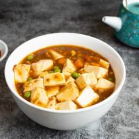 Ma Po Tofu · Tofu simmered and cooked in a spicy chili sauce