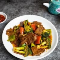 Mongolian Vegan Beef · Mongolian vegan beef sauteed with peppers and broccoli in a spicy sauce