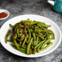 I've Bean Thinking About You · Braised string beans cooked in a spicy Chinese sauce