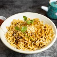 Spicy Tan Tan Noodles · Spicy noodles cooked in a creamy broth with peanut and chili oil