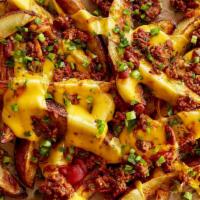 Chili Cheese Fries · Classic fries topped with house-made chili and melted  cheddar cheese