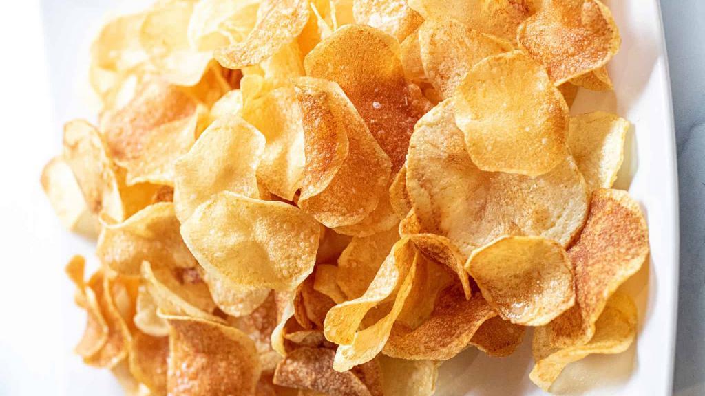 Kettle Chips · Choice of Sea Salt, Smokedhouse BBQ, Sea Salt & Vinegar and Jalapeño