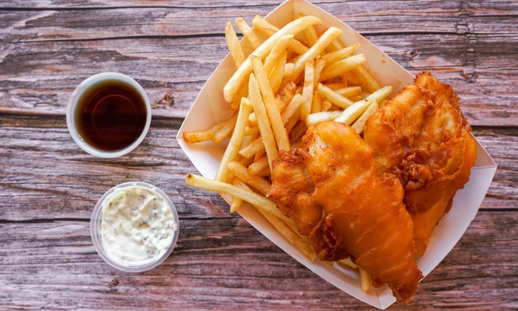 Fish & Chips · Hand dipped beer battered white fish served with french fries and side of malt vinegar and house-made tartar sauce
