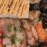 2. Nigiri Combo A · Spicy tuna roll, sake (fresh) abaco, hamachi, ebi, tai, tako, unagi, tobiko.
