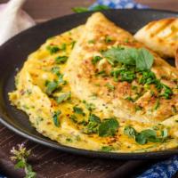 Omelette · Fresh dish made from beaten eggs, onion, Chilies and seasonings.