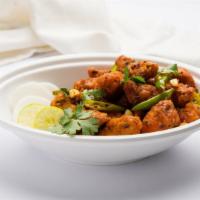 Chicken 65 · Boneless chicken pieces marinated with exotic spices and deep-fried.