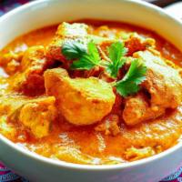 Chicken Kulambu · A delicious, flavorful curry made with seasoned chicken.