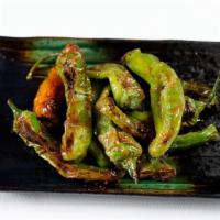 Blistered Shishito Peppers · Blistered shishito pepper, sesame oil and togarashi.