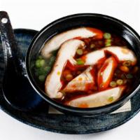 Spicy Miso Soup · Shiro-dashi broth, shiitake mushroom, tofu, shaved scallion and chilli oil.