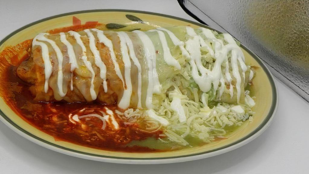 Super Burrito · Beans, Rice, Cheese, Sour Cream, Salsa and Choice of Meat