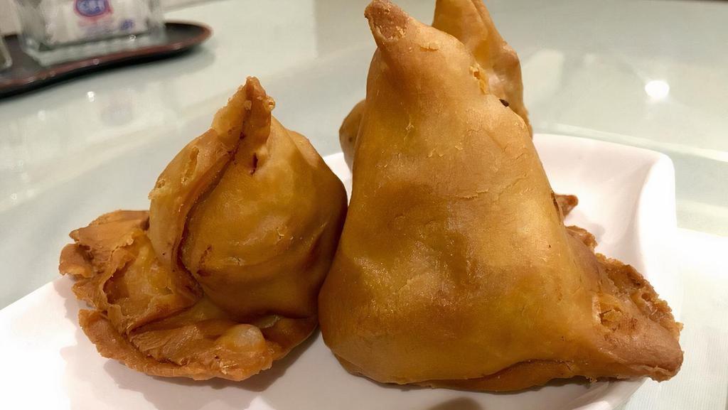 Vegetable Samosa · Pastry with vegetable stuffing with potato and green pea.
