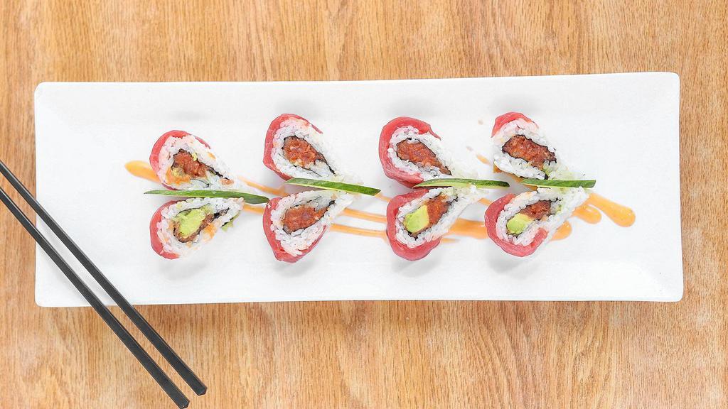 Loving Heart Roll · Spicy. Spicy tuna, crab, avocado inside, topped with tuna.