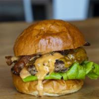 Bacon Burger · 1/3 lb richard's grassfed beef, cheddar cheese, bacon, grilled onions, lettuce, konjoe sauce...