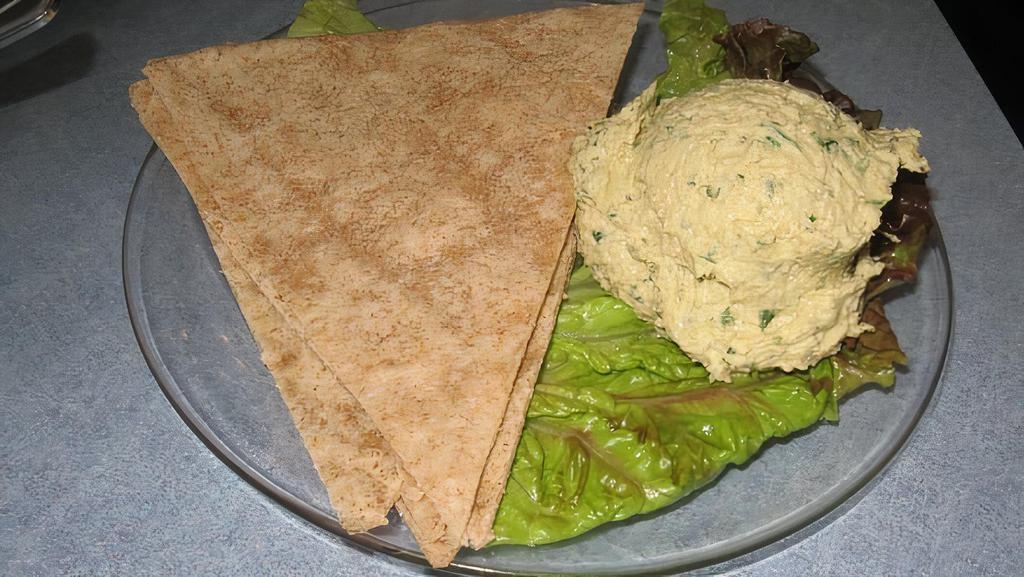 Hummus & Chapati · Vegan. Our fresh homemade hummus served with grilled whole wheat tortilla slices.