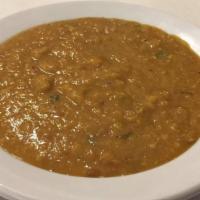 Dal · Our signature red lentil dal (spicy Indian lentil soup).