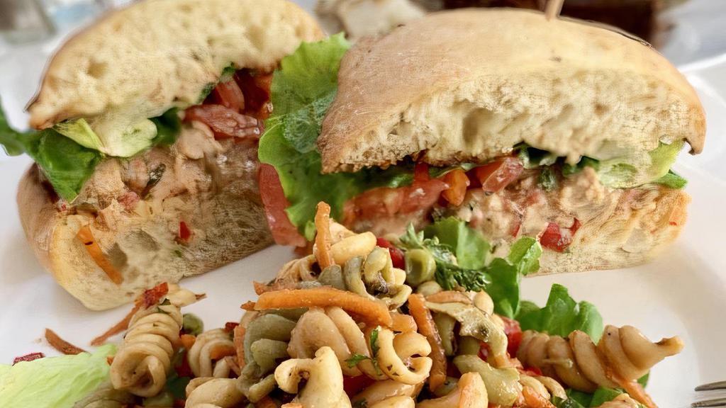 Chicken Salad Sandwich · Vegan. Veggie chicken with our vegan mayo, sweet relish, celery, parsley, and red bell peppers on ciabatta bread.