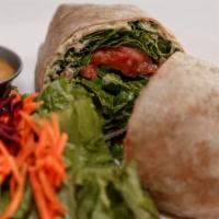 Mediterranean Roll-Up · Vegan. Fresh homemade hummus in a whole wheat tortilla with roasted red peppers, olives, let...