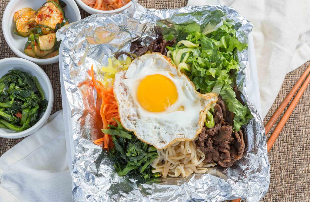 Bibimbap · Rice topped with seasoned vegetables carrots, radish, spinach, zucchinis, and your choice of protein. Topped with an egg and a side of our house made red sauce.