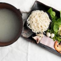Classic Yunnan Rice Noodle · shrimp.ham.chicken,sliced pork,quail eggs, bean sprout, spinach, green onion, cilantro and h...