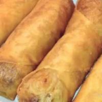 Egg Roll 春 · 4 pieces of egg rolls - Fried and stuffed with cabbage and carrots. Vegetarian friendly