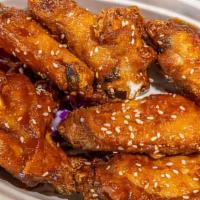 Chicken Wings (6) · soy garlic or sweet & spicy