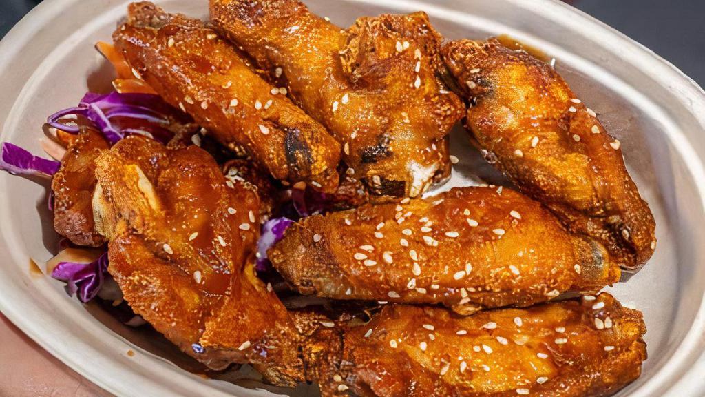 Chicken Wings (6) · soy garlic or sweet & spicy