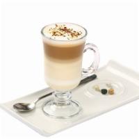 Vanilla Caffè Latte · Freshly pulled espresso shot mixed with vanilla syrup and steamed milk and a light layer of ...