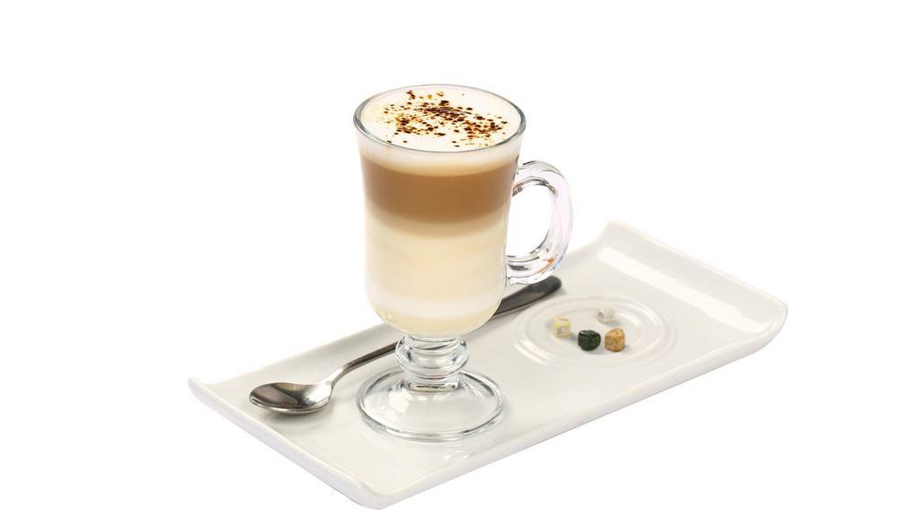 Vanilla Caffè Latte · Freshly pulled espresso shot mixed with vanilla syrup and steamed milk and a light layer of foam.