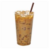 Iced Caffè Latte · Freshly pulled espresso shot mixed with steamed milk and a light layer of foam over ice.