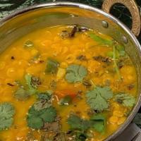Daal · Yellow lentils cooked in a special blend of spices. Vegan.
